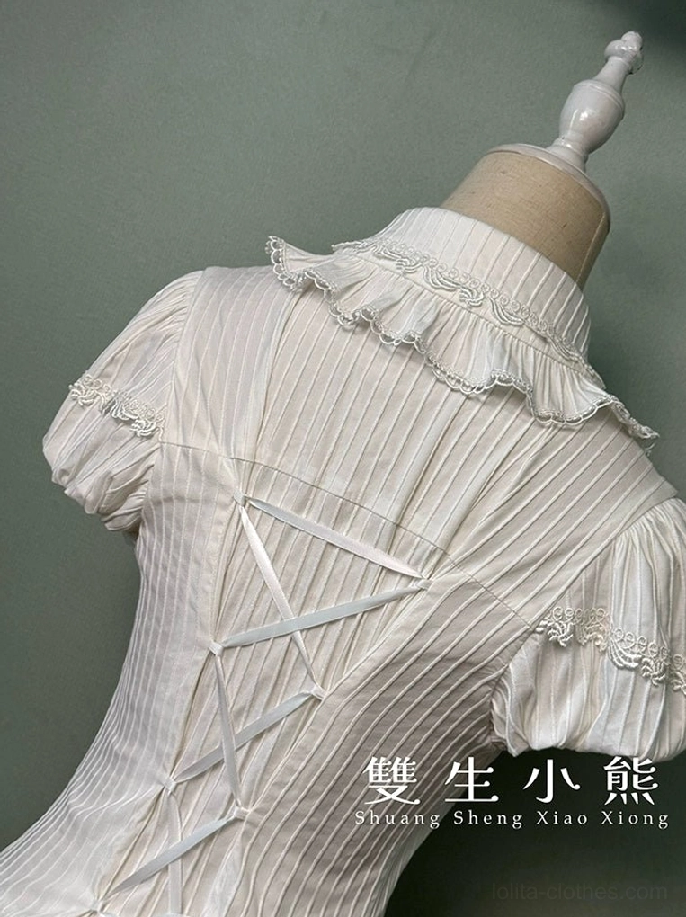Lolita blouse waist-defining silhouette detail showing architectural tailoring and figure-flattering construction on dress mannequin