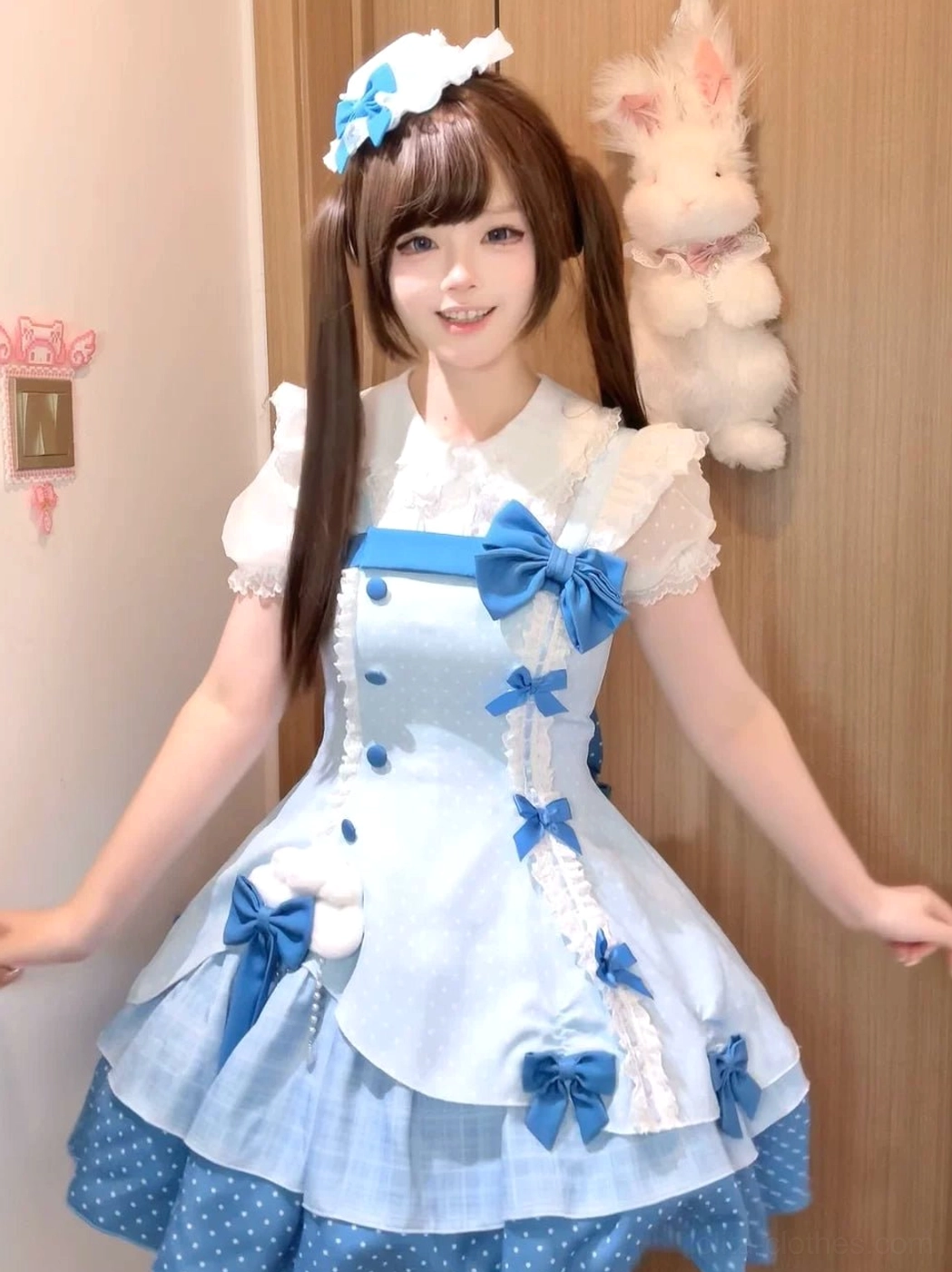 Lolita dress blouse component showing white doll collar, short-sleeve design, coordination with JSK, worn in complete sweet lolita outfit