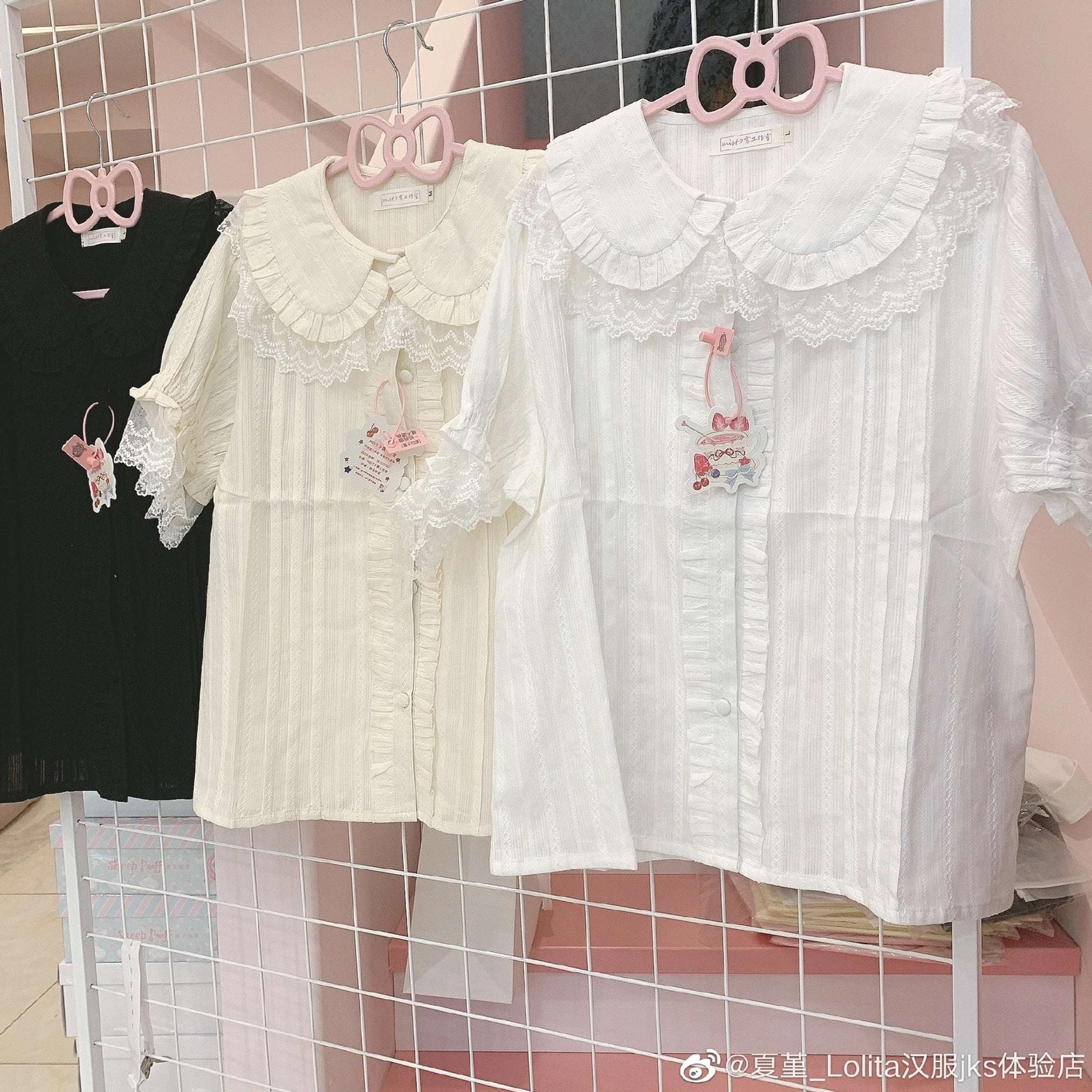 Lolita short sleeve blouses peter pan collar puff sleeves lace trim hanging display clothing rack multiple colors