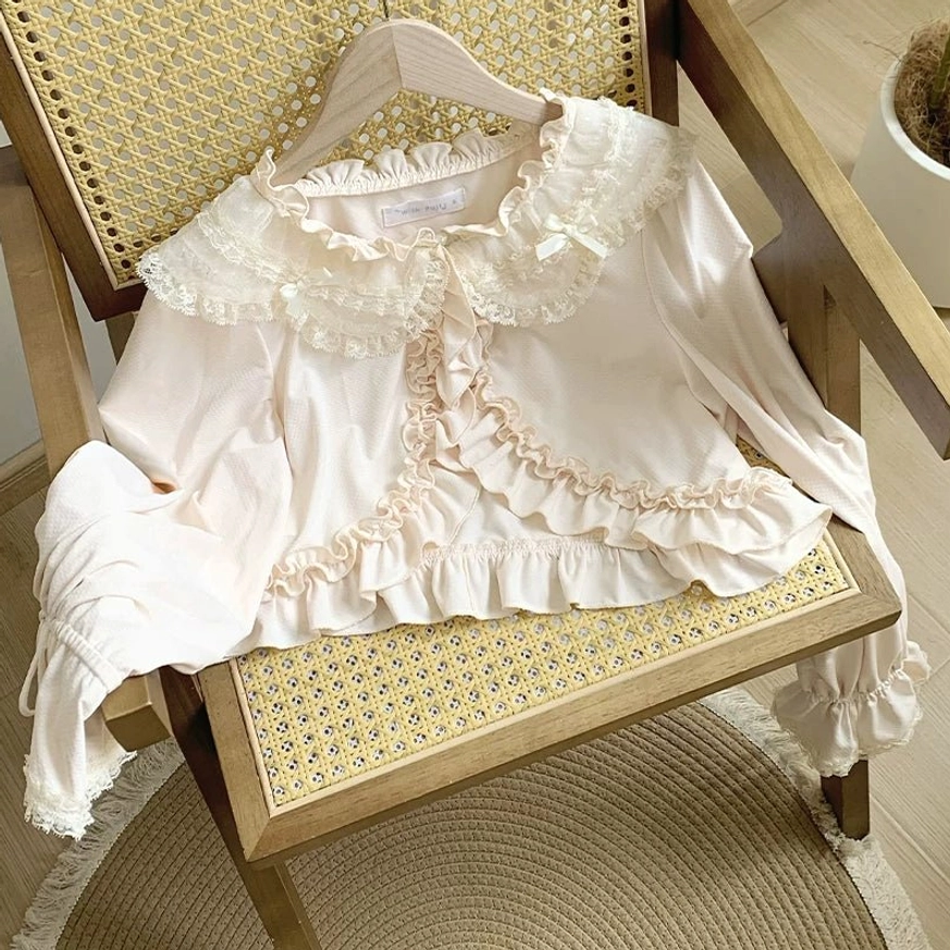 Sweet lolita bolero back view construction details ruffles lace trim cropped length showcasing posterior silhouette and overall garment structure