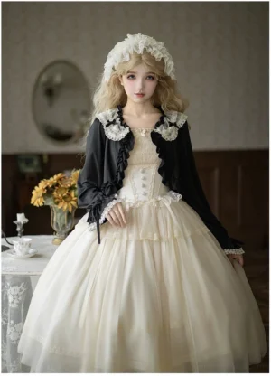 Female model wearing black sweet lolita bolero with white frilly lolita dress lace headband vintage tea room interior styling complete outfit coordination