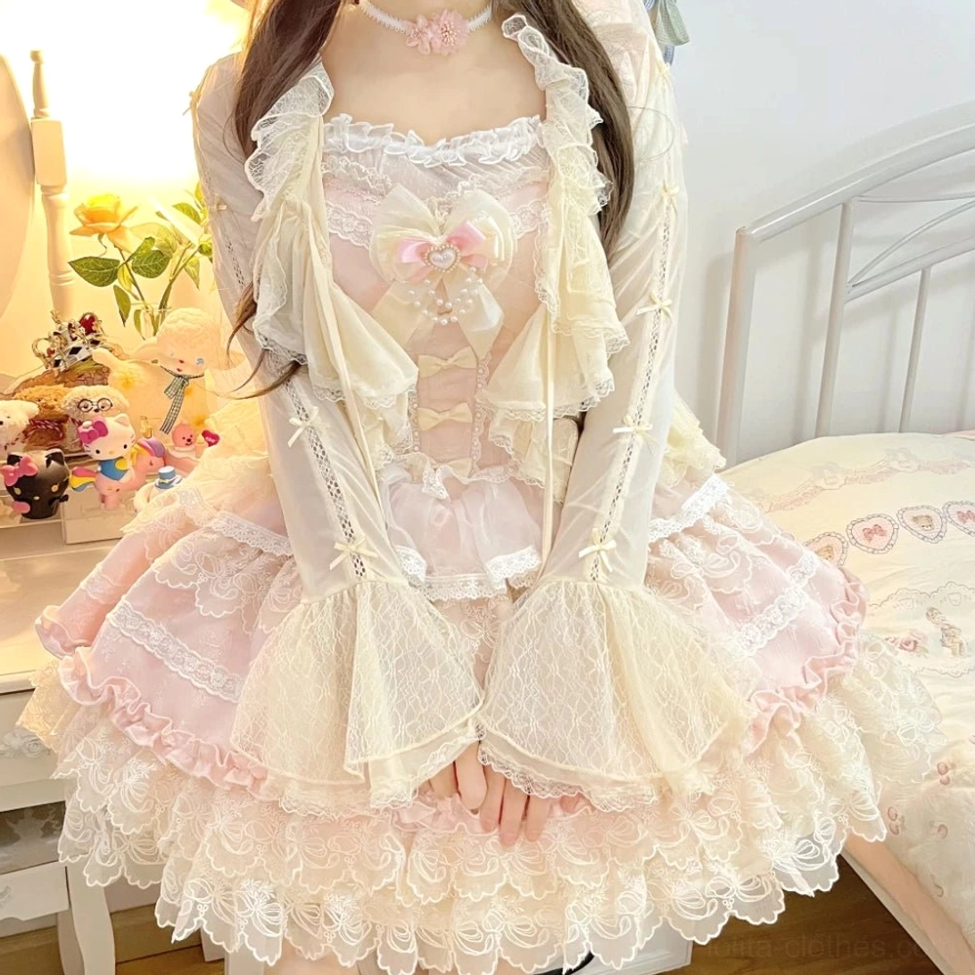 Front placket and bodice detail of sweet lolita tulle bolero with satin bows and lace trim embellishments, showcasing careful hand-finished construction quality