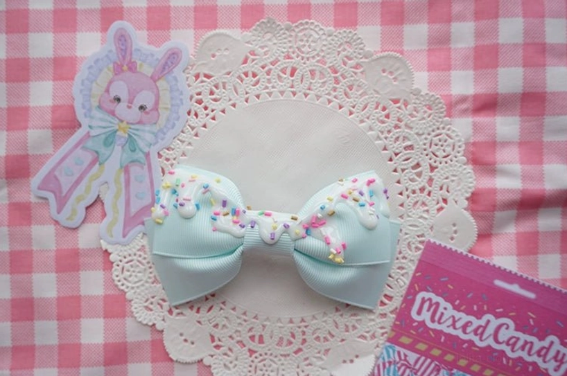 Red sweet lolita bow hair clip with bold statement cream frosting decoration perfect for gothic lolita fashion coordinates