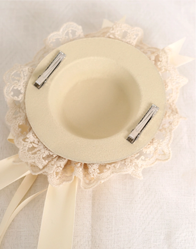 Sweet lolita bow headband with adjustable retaining clip feature for secure comfortable fit all-day wear