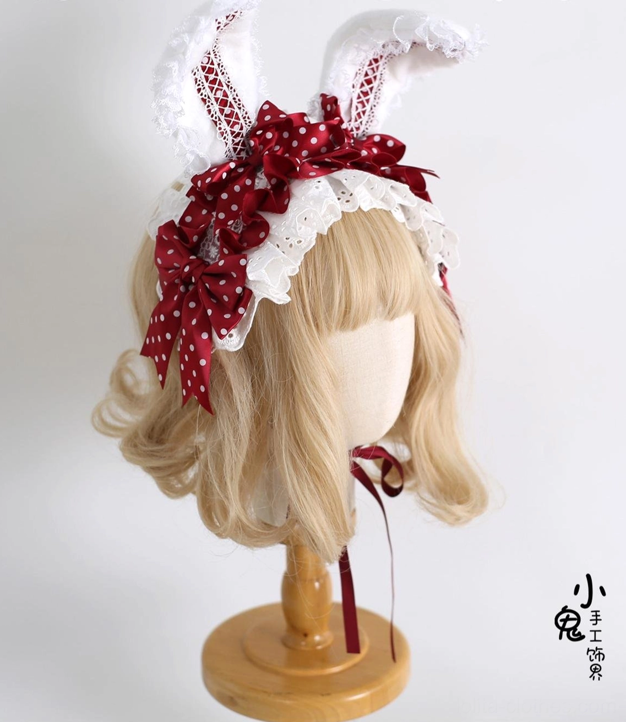 Red sweet lolita bunny ear hairband with lace decoration and adjustable neck strap on head display