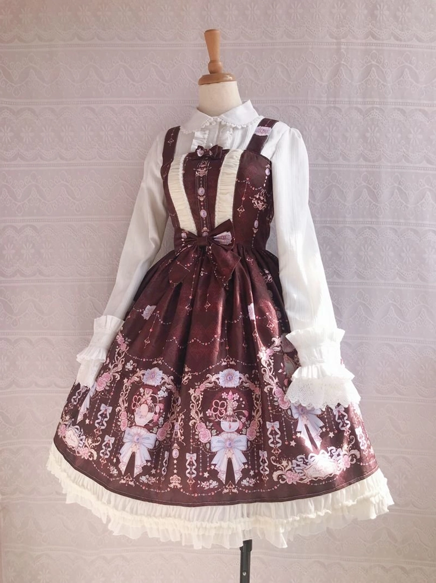 Front view of burgundy sweet lolita JSK dress with white ruffled long sleeves dark burgundy vintage printed skirt front waist bow frilled lace hem