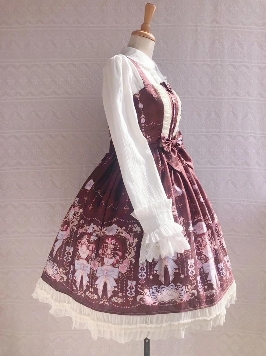 Side front angle of burgundy sweet lolita JSK dress with attached long sleeves dark burgundy base vintage print decorative front waist bow frilled hem
