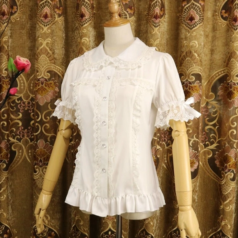Milk white short-sleeve sweet lolita blouse with fitted silhouette and ruffled hem, right side full view showing lace sleeve details