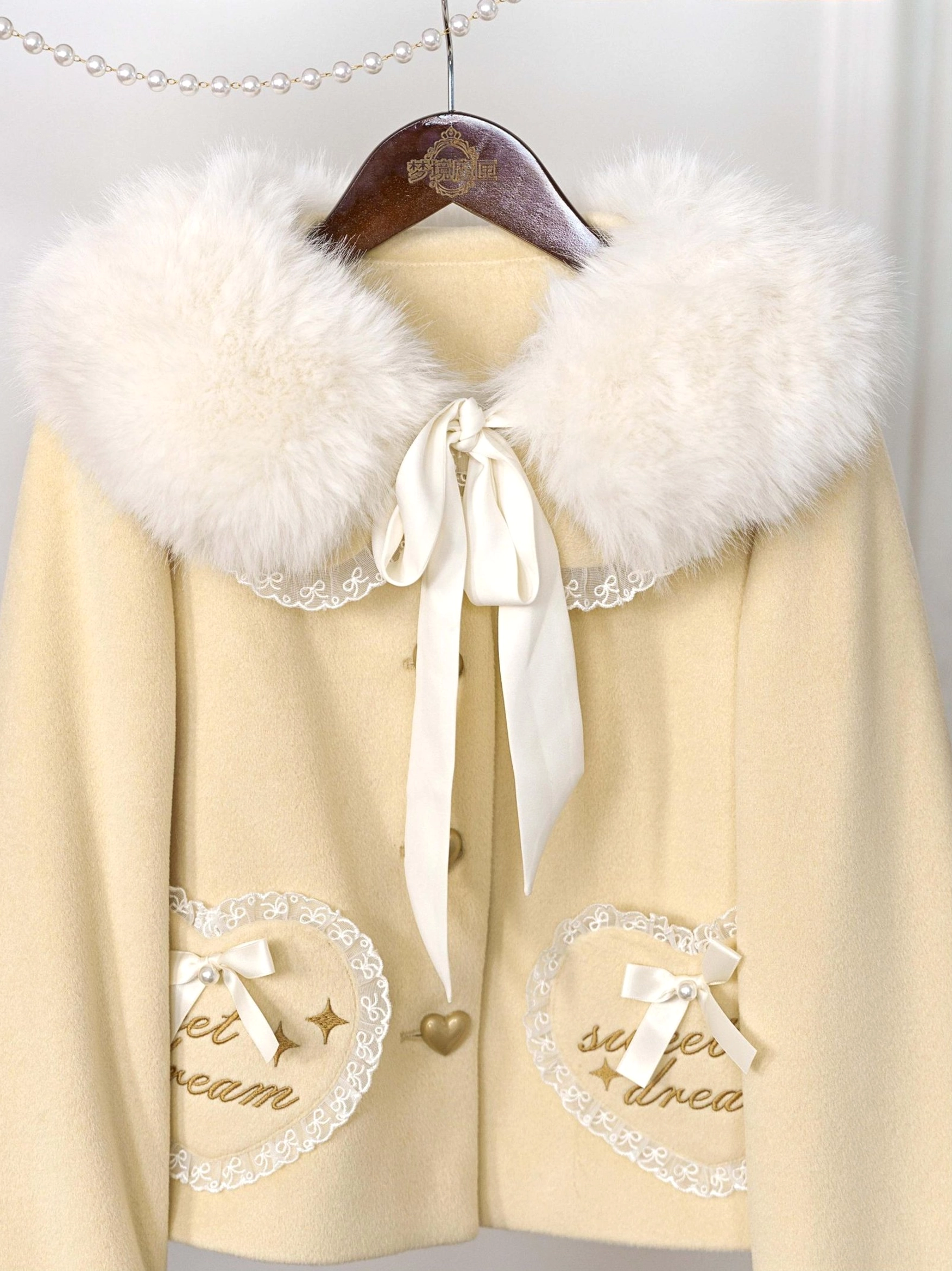 Lolita winter fleece coat showing back view of peter pan collar design structured silhouette and overall construction quality