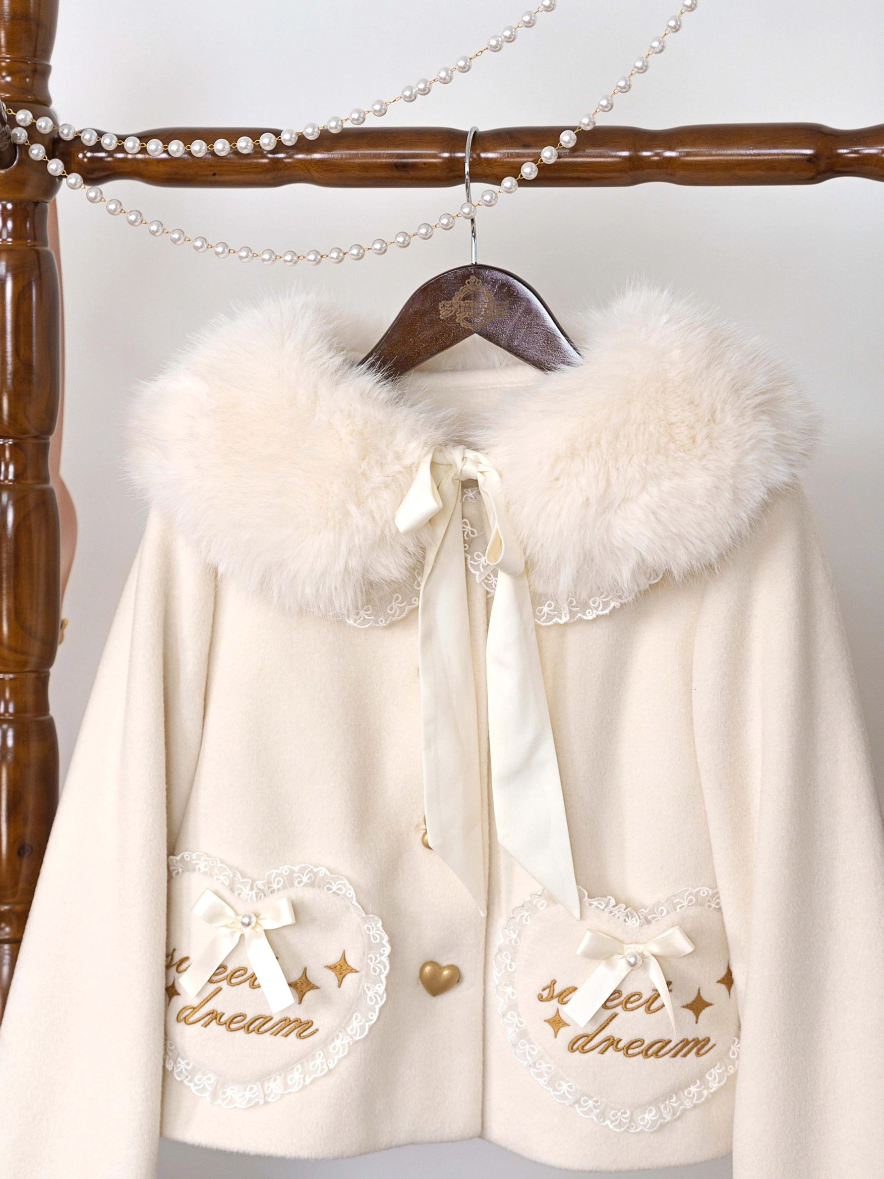 Sweet lolita coat care instructions showing recommended dry cleaning storage on hanger and air drying techniques for garment preservation
