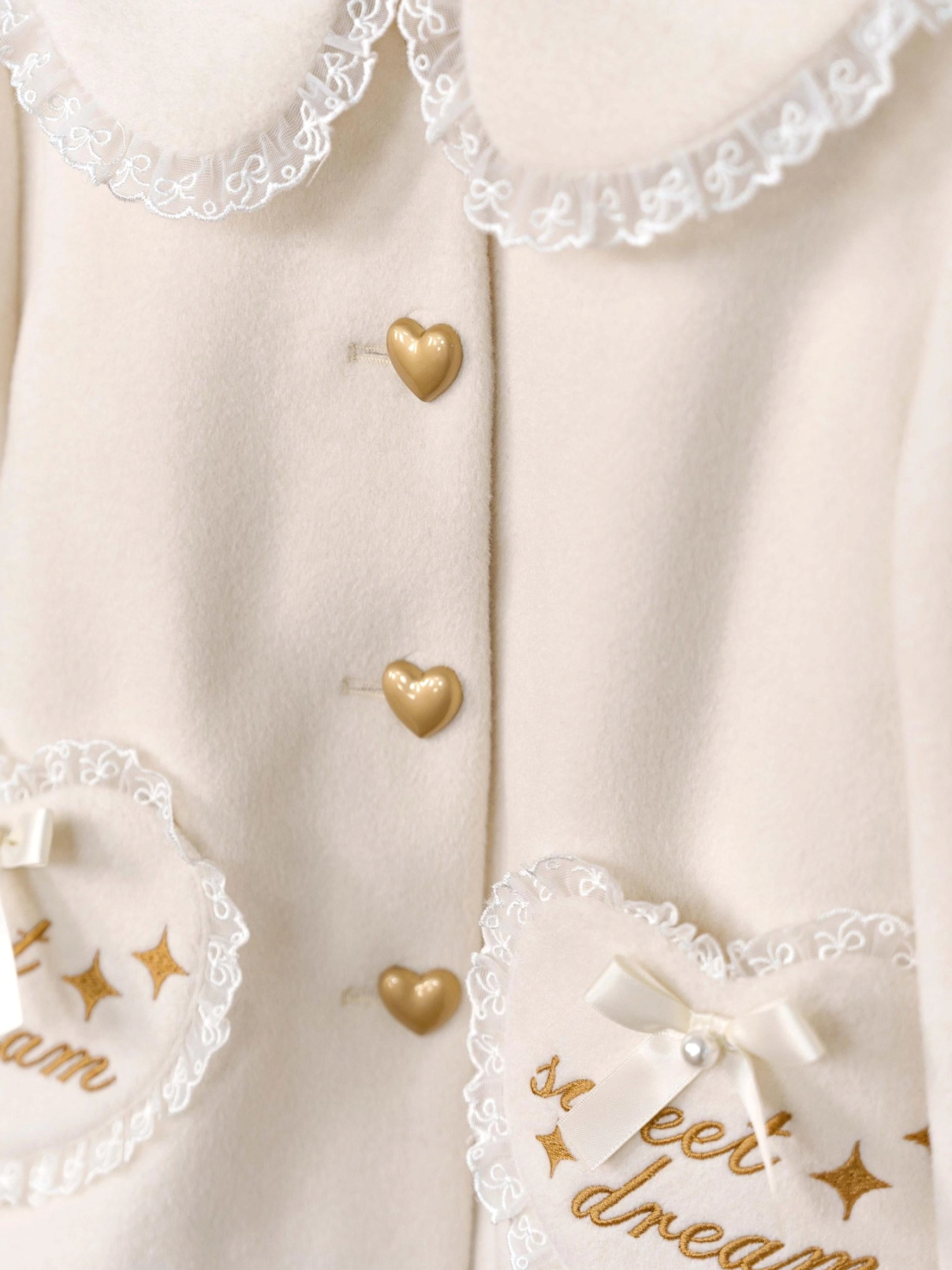 Sweet lolita winter coat color palette showing all available hues black cream beige soft pink and pale yellow with styling versatility