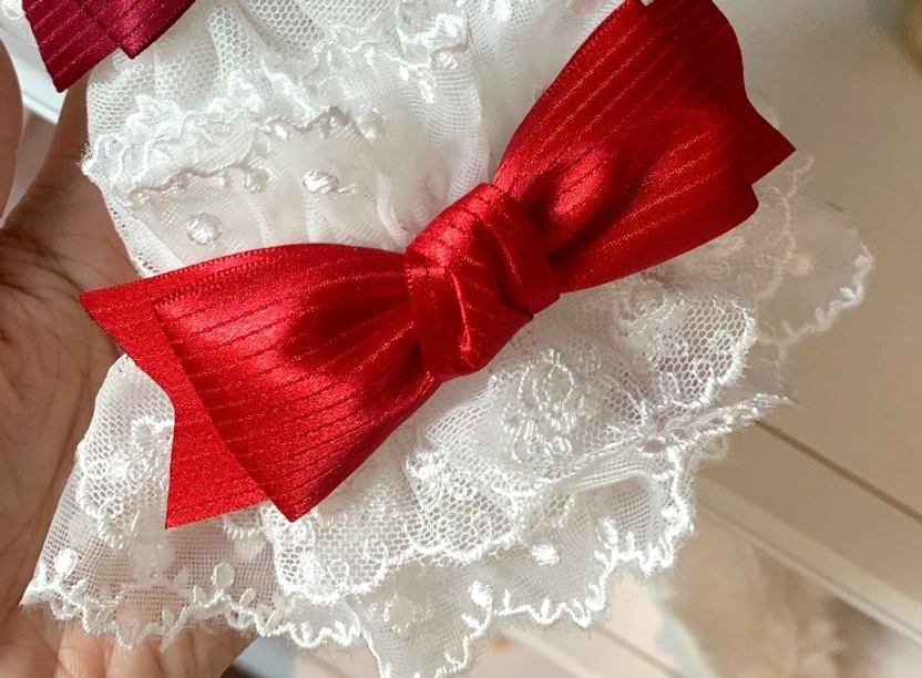 White lace Sweet Lolita wrist cuffs with red satin bow romantic Lolita fashion accessory