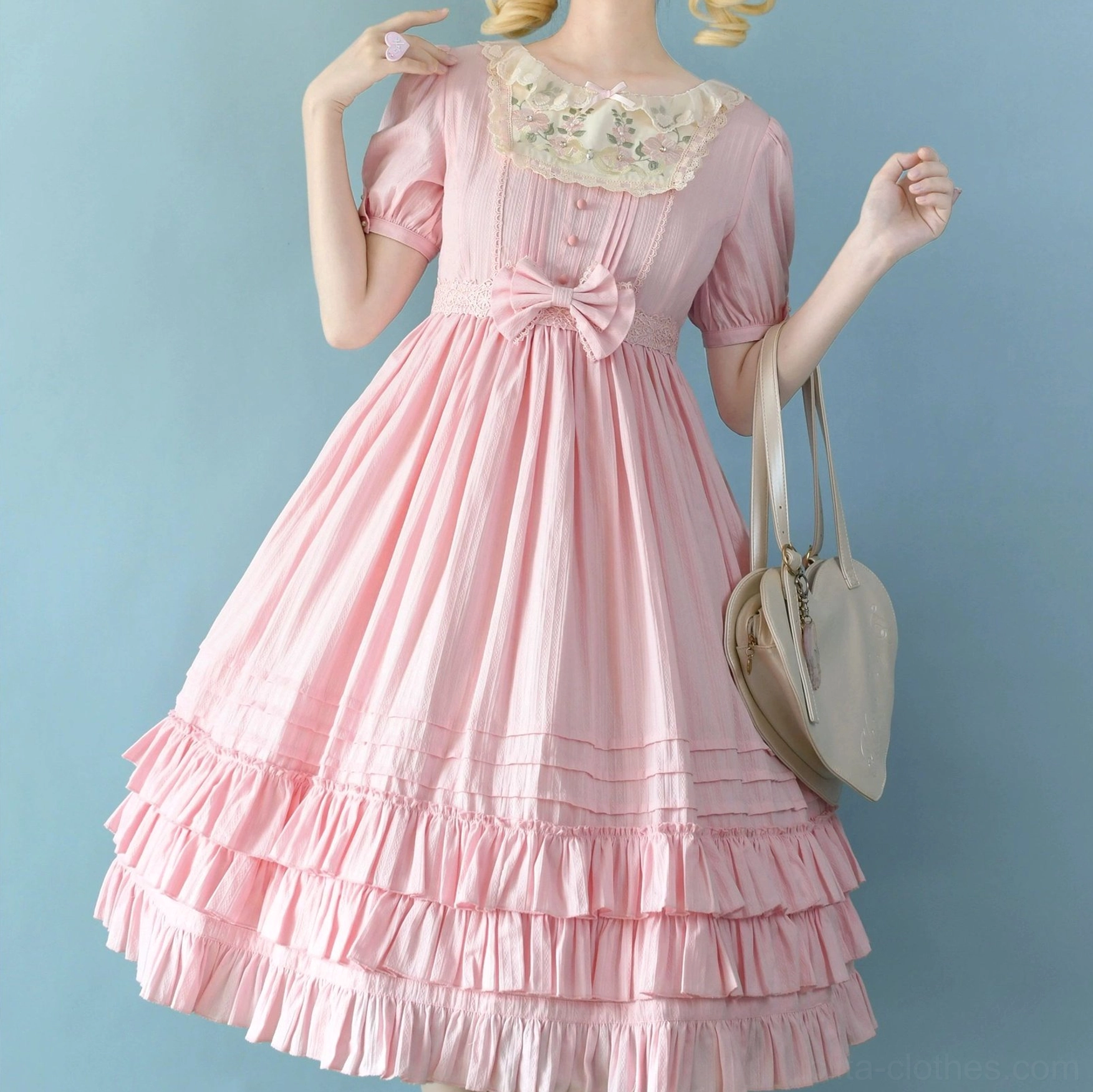 Soft pink Sweet Lolita embroidered OP dress in short-sleeved long midi length, featuring lace embroidered collar, tiered ruffled skirt, front waist bow, and delicate feminine details perfect for Lolita fashion