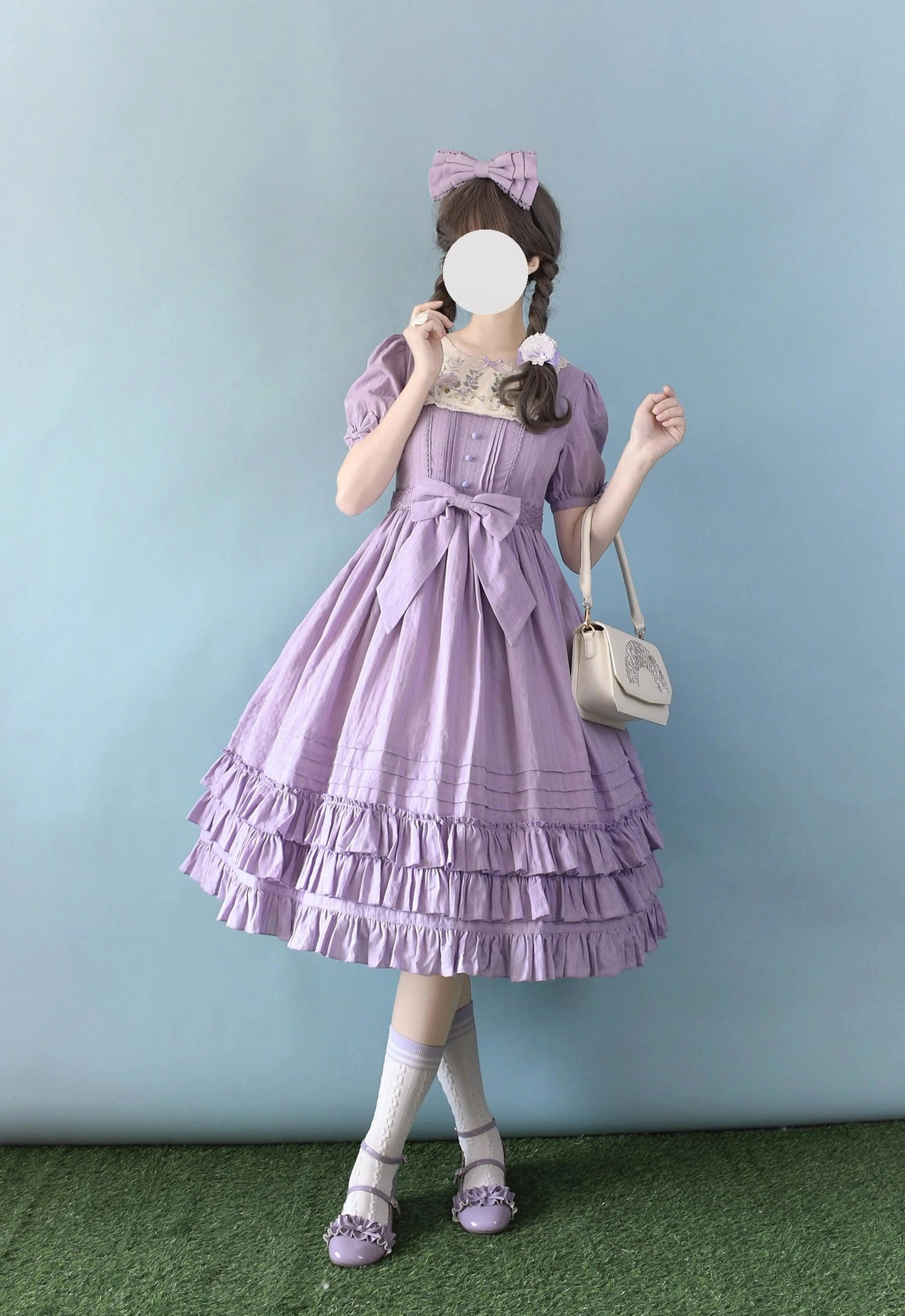 Sweet Lolita embroidered OP dress in taro purple with short puff sleeves, ruffled tiered midi skirt, embroidered lace collar, and detachable waist bow, full-body front view with coordinating white handbag and shoes