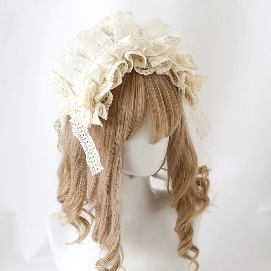 Sweet lolita lace hair headdress front close-up view on curly blonde wig mannequin, cream white full layered ruffled crown with side lace bow featuring hanging tassels vintage sweet lolita style
