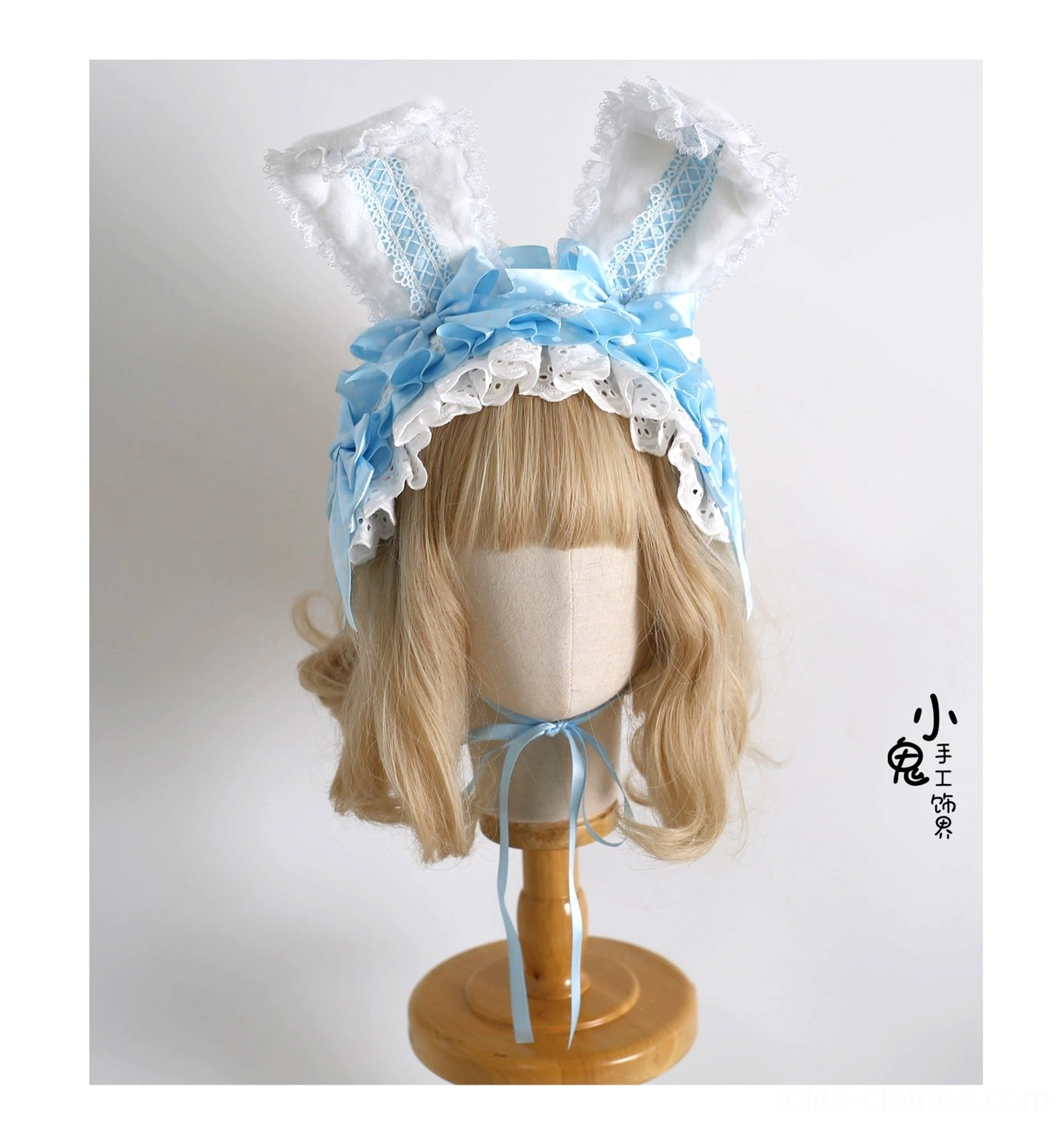Light blue satin sweet lolita bunny ear hairband white lace trim on mannequin with blonde wig watermark