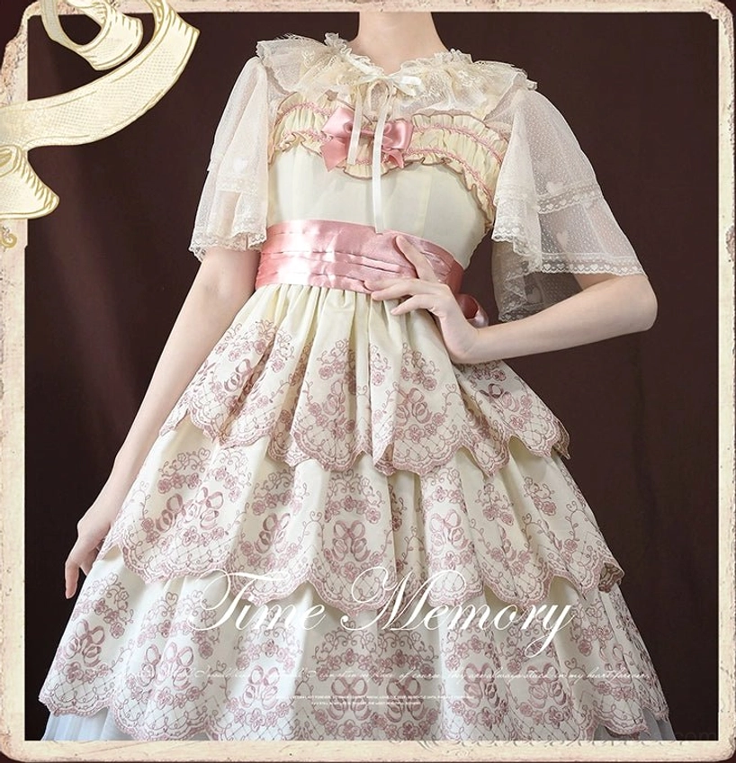 Pink bow sweet lolita cardigan with heart lace flutter sleeves and ruffled neckline styling detail