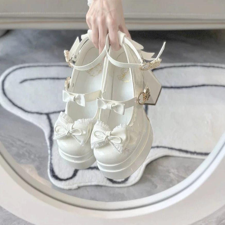 Sweet Lolita platform heel shoes detail view of front ruffled bow and decorative elements on shoe vamp
