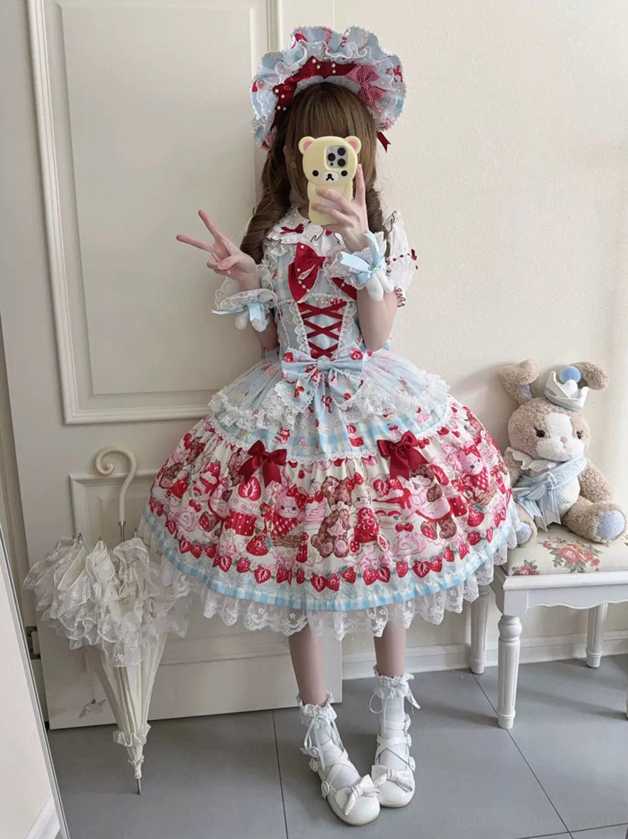 Sweet lolita strawberry bear JSK dress shoulder strap adjustment showing flexible fit design feature