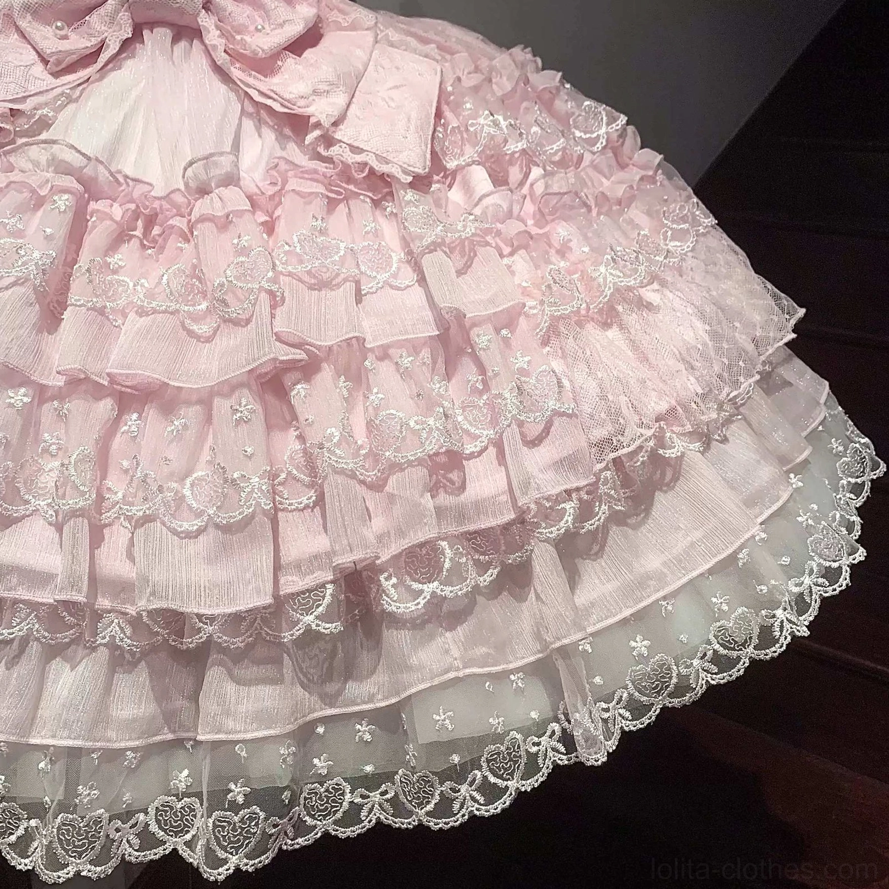 Sweet Lolita JSK dress showing adjustable shoulder straps and square neckline framing with coordinating inner blouse