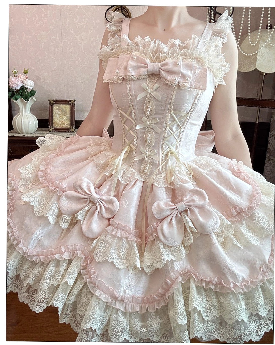 Sweet lolita JSK close-up front view model vintage bedroom lace-up corset front large satin bows ruffled lace trim pink white boned waist