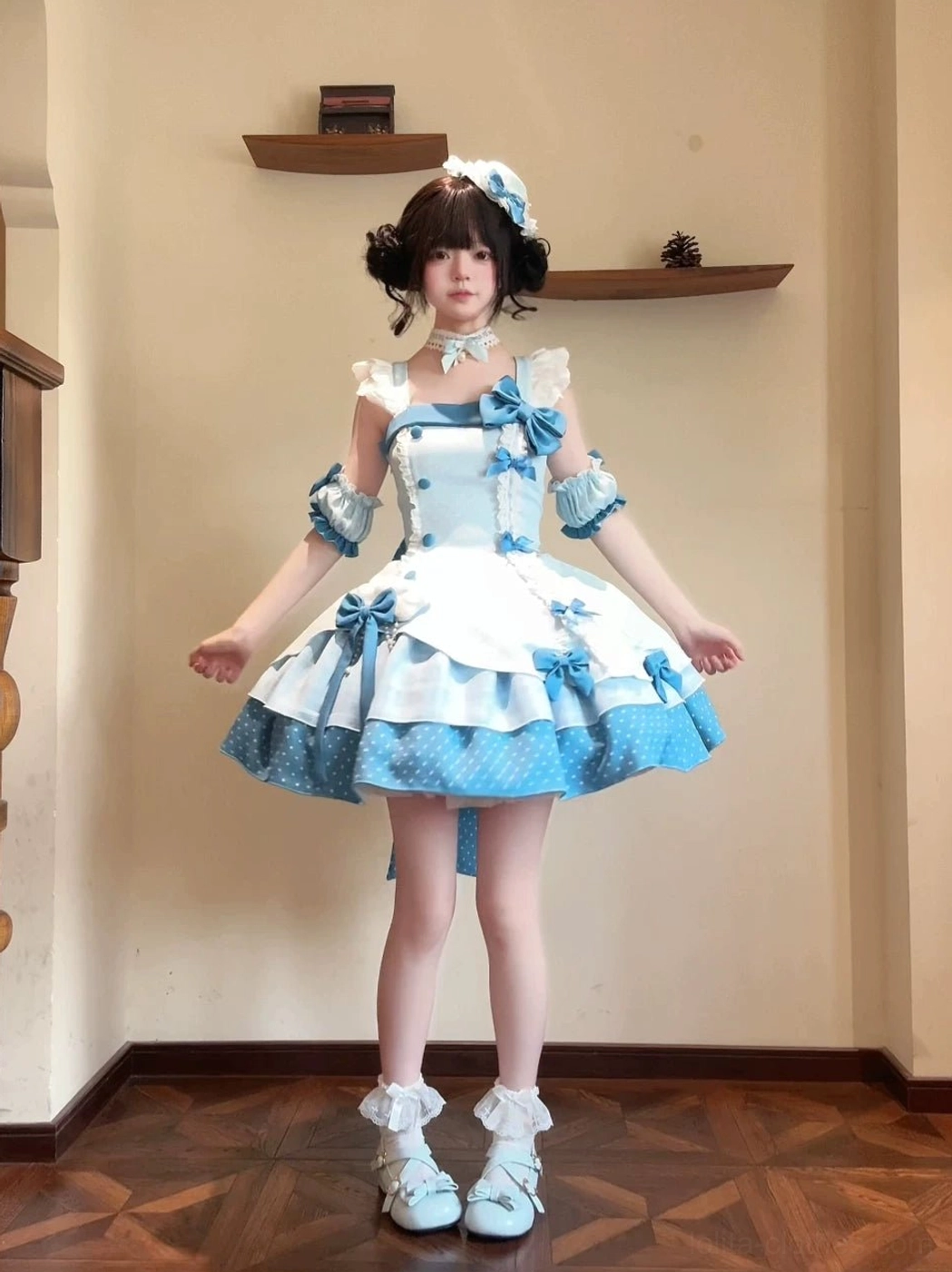 Sweet Lolita dress color detail and fabric texture close-up showing sky-blue polka dot patchwork, polyester material quality, ruffled edge finishing, and design precision