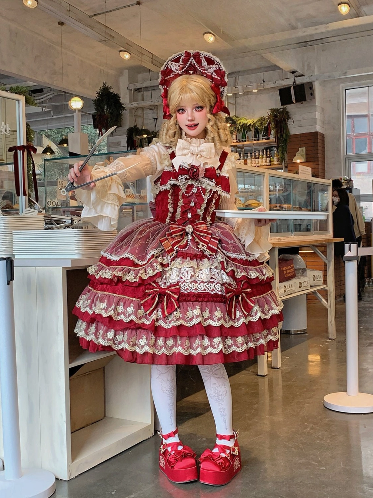 Sweet lolita JSK jumper skirt detail photo highlighting tulle lace trim and bow embellishments