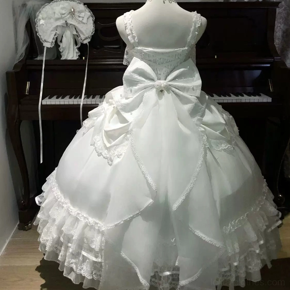 Sweet wedding Lolita JSK dress with adjustable shoulder straps and back shirring panel design fitted on diverse model to showcase comfortable fit and body-friendly construction