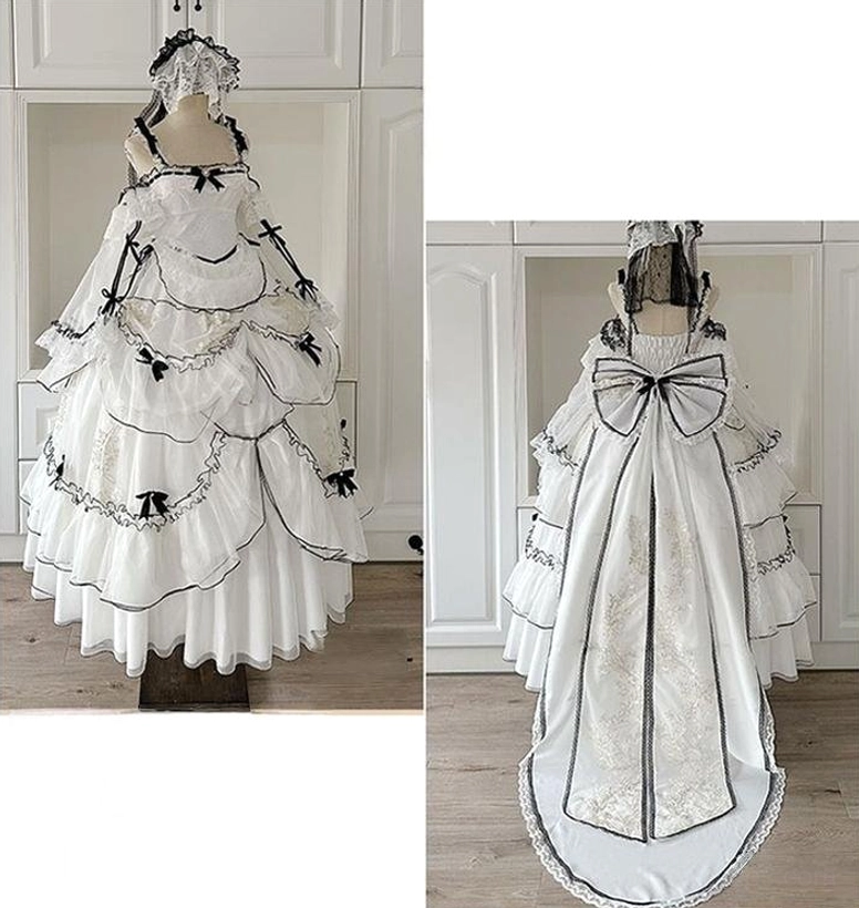 Sweet lolita JSK dress black and white contrast details highlighting satin ribbons, embroidered elements and decorative bow accents for romantic elegance