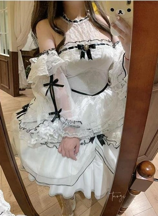 Sweet lolita JSK dress material and fabric texture close-up showing lace, chiffon and polyester blend for durability and elegant drape