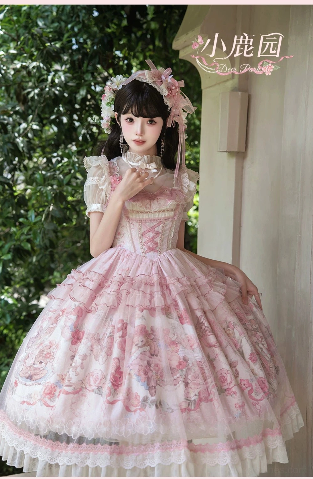Overhead flat lay view sweet lolita JSK dress showing full print pattern waist bow placement tulle overlay dimensional texture