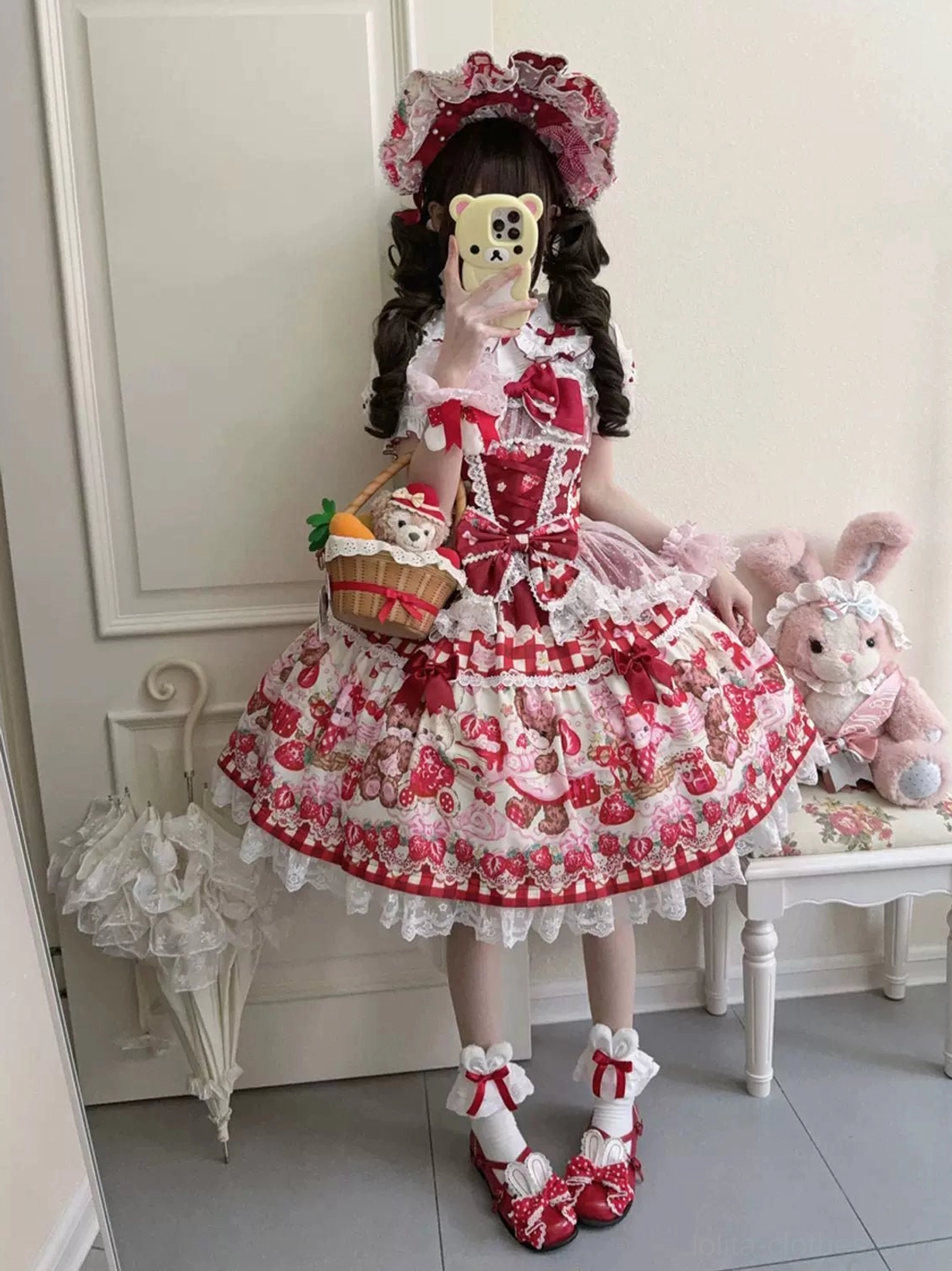 Sweet lolita strawberry bear JSK dress hem detail showing layered ruffles and lace construction quality