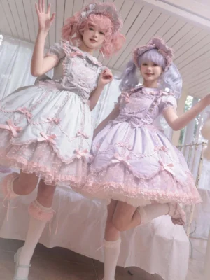 Sweet vintage Lolita jumper dress JSK set with petal-hem and coordinating bonnet displayed on two models in pastel wigs