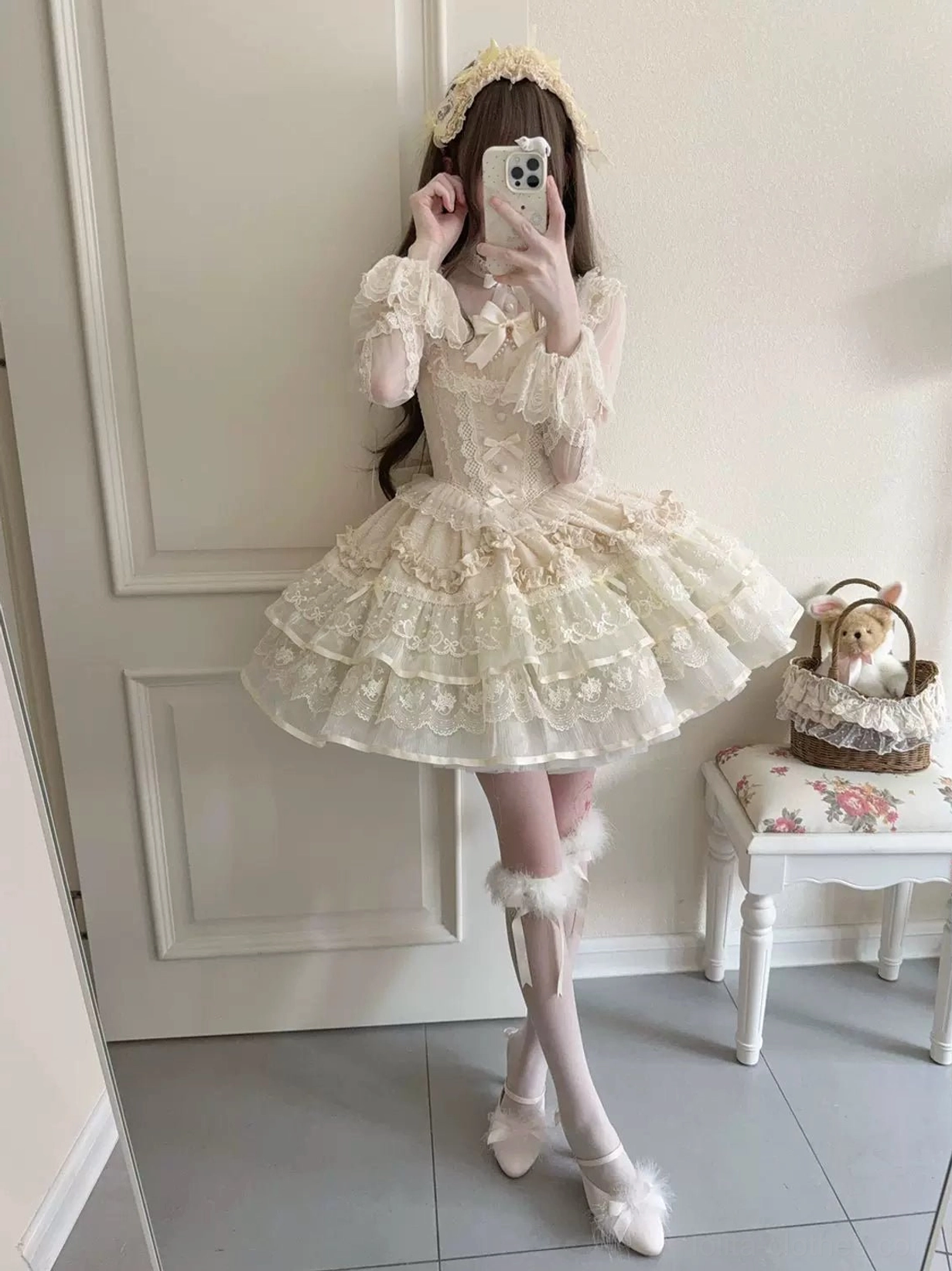 Three-quarter view of sweet lolita jumper skirt highlighting the dimensional petal-style layered ruffles, lace trim details, and graceful silhouette of the JSK dress