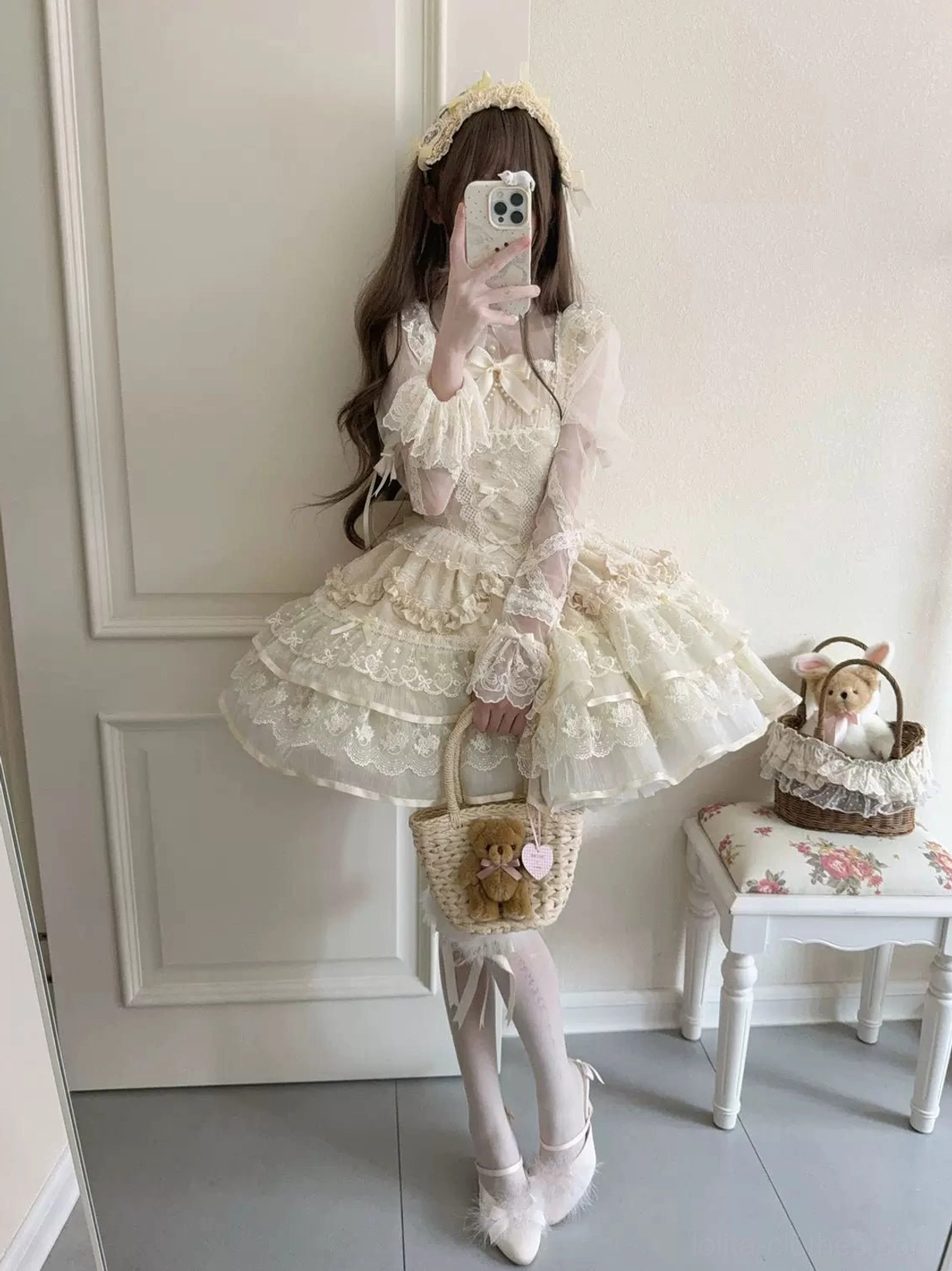 Sweet lolita JSK dress detail shot showing delicate lace embellishments, multi-layered petal ruffles, fine stitching, and premium fabric quality of the jumper skirt