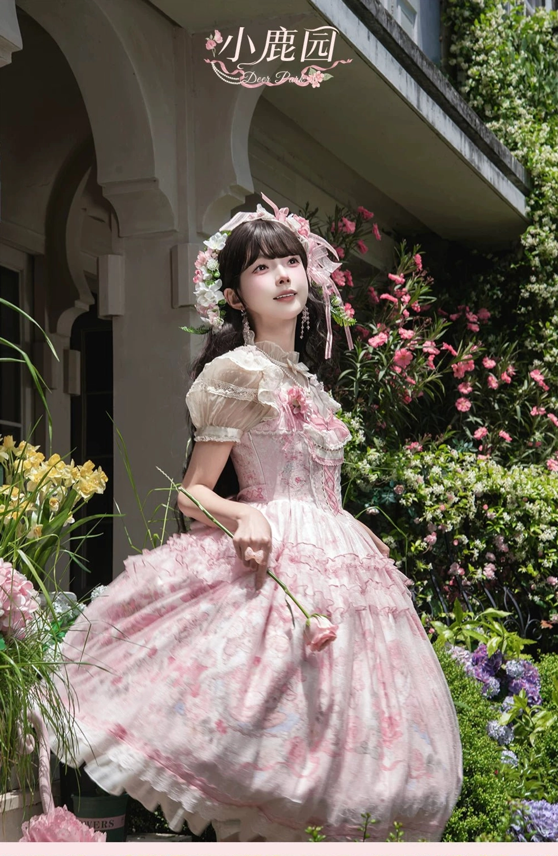 Sweet lolita jumper skirt side view highlighting flutter sleeves square neckline full A-line skirt silhouette and tulle layering