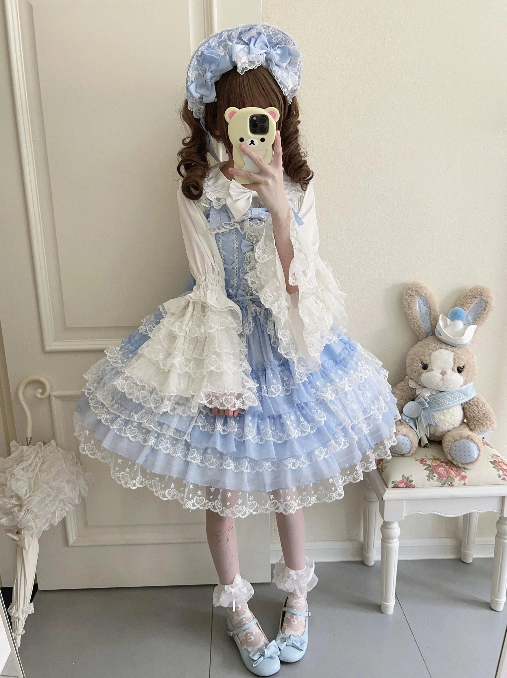 Sweet Lolita jumper skirt hem detail showing tiered ruffle construction, stitch quality, and finishing techniques