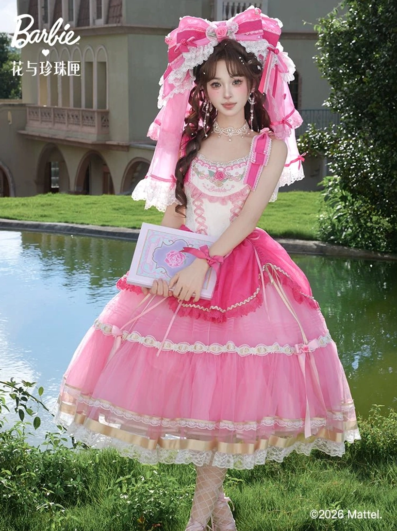 Sweet lolita jumper skirt JSK detailed view of adjustable shoulder straps and back shirring, pink and off-white color scheme with floral embroidery neckline and lace trim details