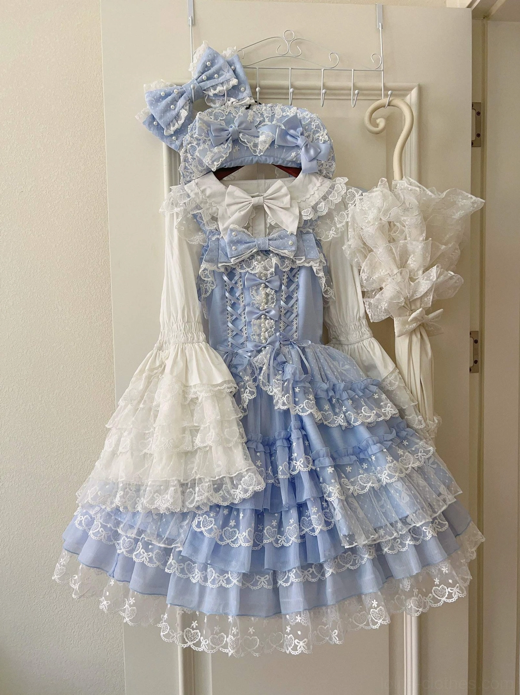 Sweet Lolita jumper skirt showing neckline design, shoulder positioning, and upper bodice frame construction