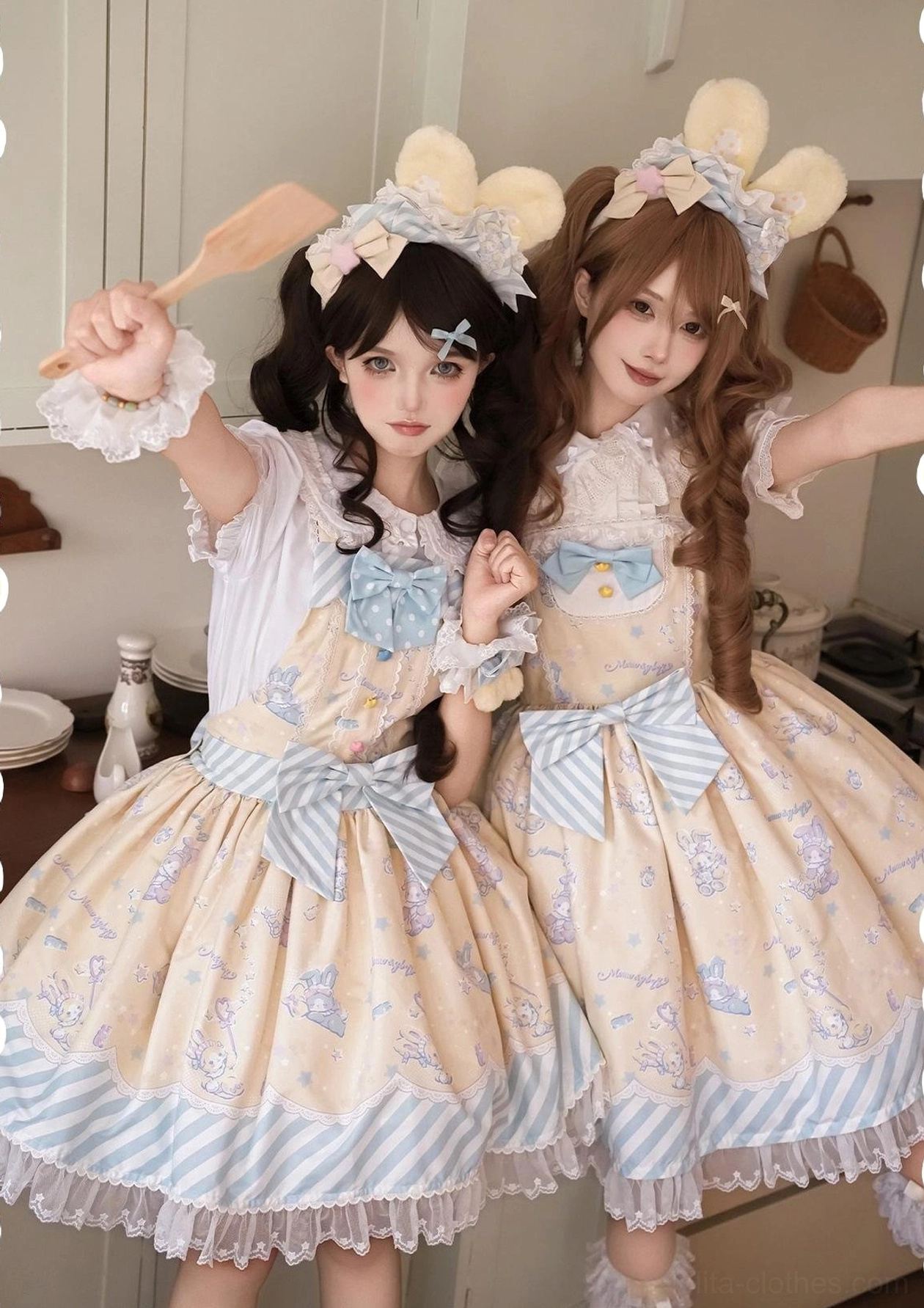 Overhead flat lay of sweet Lolita jumper skirt with detachable apron, showing full skirt spread, lace trim details, bunny print coverage, and color options