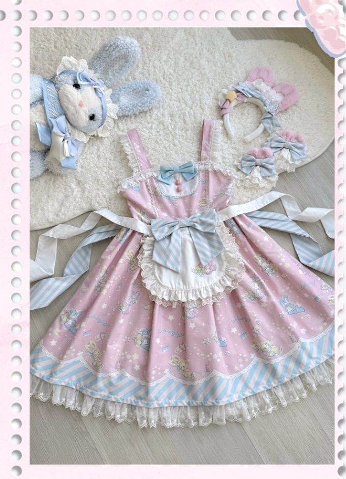 Photography backdrop and styling scene for sweet Lolita jumper skirt featuring props, lighting, and aesthetic presentation context