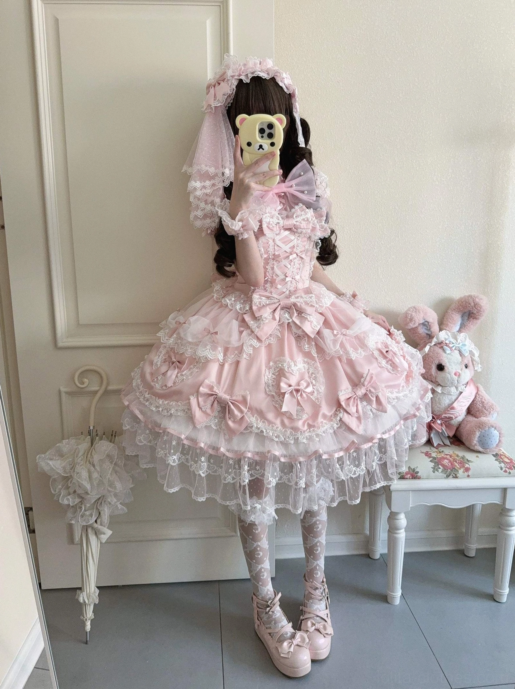 Sweet Lolita JSK jumper dress on model mirror selfie pink-white lace veil frilled socks pink lolita shoes curly dark hair