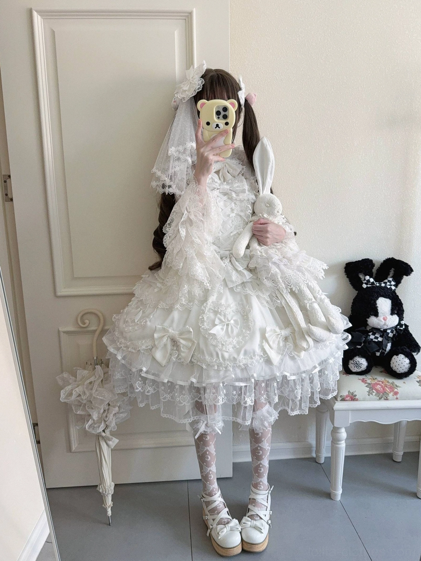 Sweet Lolita JSK jumper dress on model mirror selfie all-white long lace gloves frilled socks white lolita shoes plush rabbit