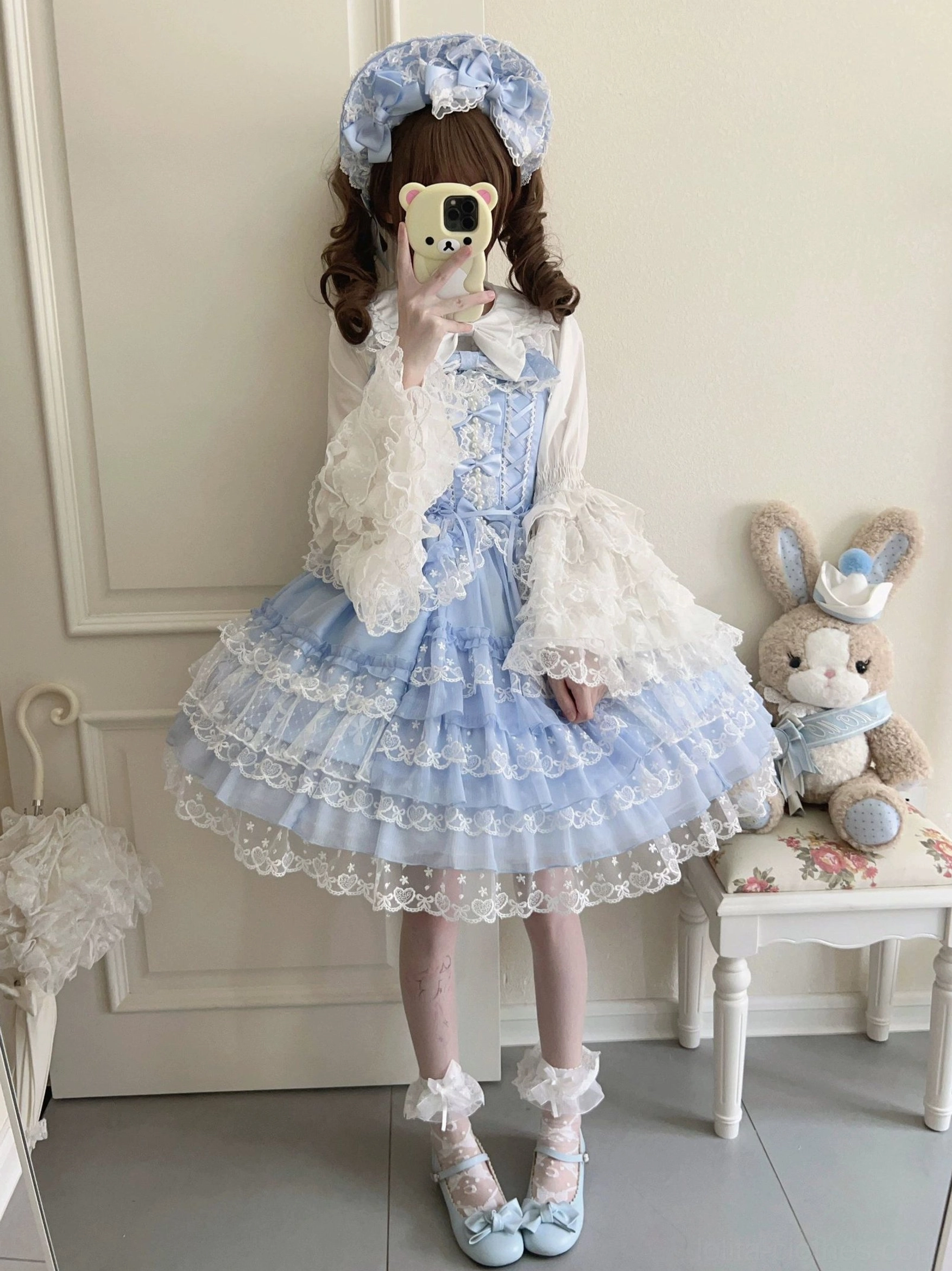 Sweet Lolita JSK dress sleeve and cuff detail showing frilled flared lace edges and arm opening construction