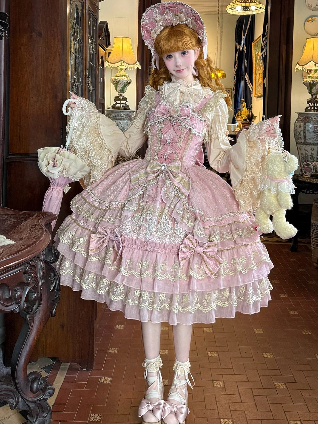 Sweet lolita JSK sleeve and shoulder detail with adjustable ruffled strap and lace edging