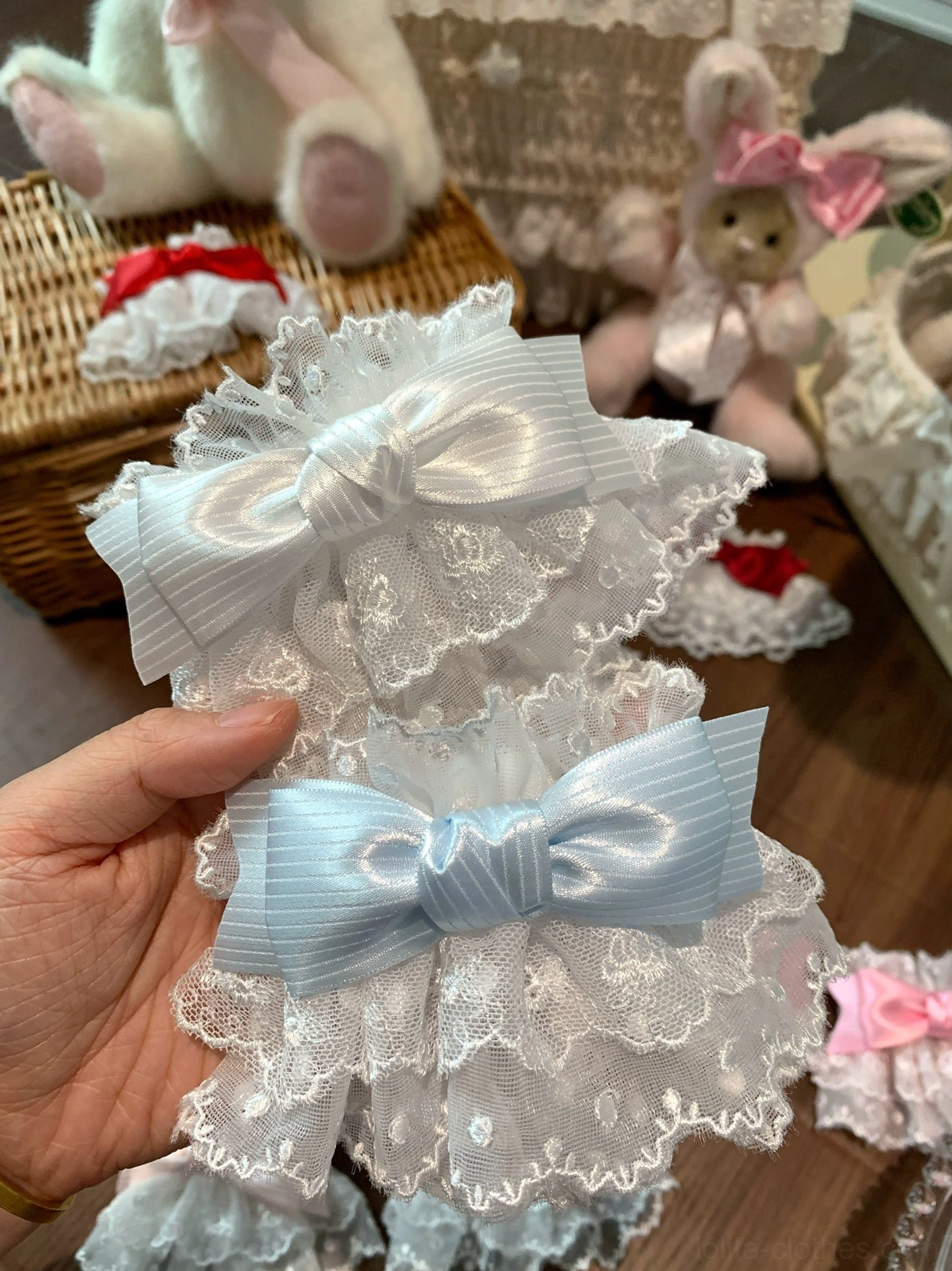 Sweet Lolita lace bow elastic wrist cuffs styled on wrist showing comfortable fit and elegant appearance