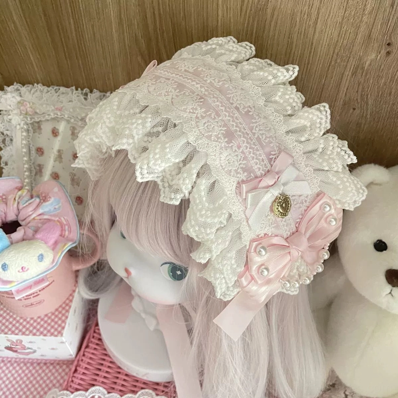 Sweet Lolita handmade lace bonnet hairband side profile, frilled white lace trim, pink satin bow accents, pearl and gold heart ornament details
