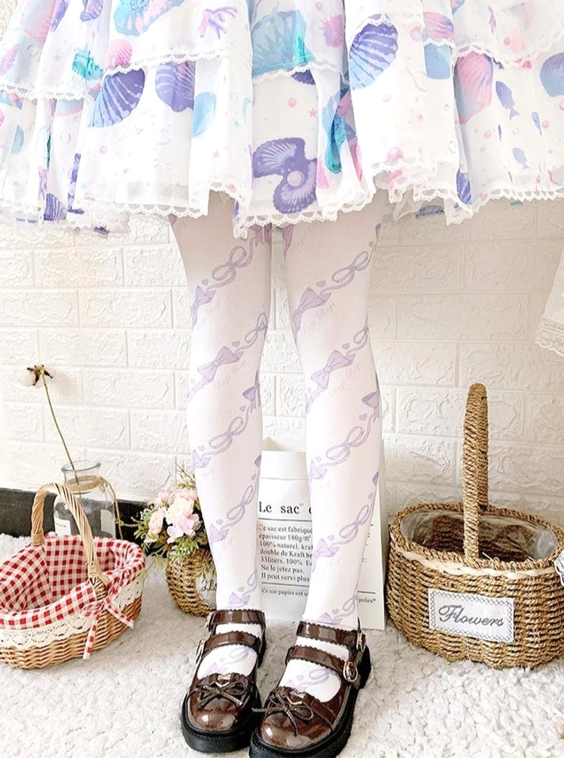 Sweet Lolita lavender purple bow print velvet knee-high stockings front view brown Mary Jane shoes white brick background seashell print frilly skirt