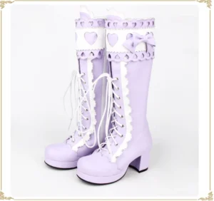 Sweet lolita lavender purple mid-calf thick heel boots front view with heart cutouts lace trim and satin bow on white background