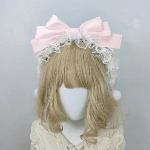 Pure Light Pink Sweet Lolita Oversized Bow Headdress with White Ruffled Lace Trim and Pompom Accents on Mannequin